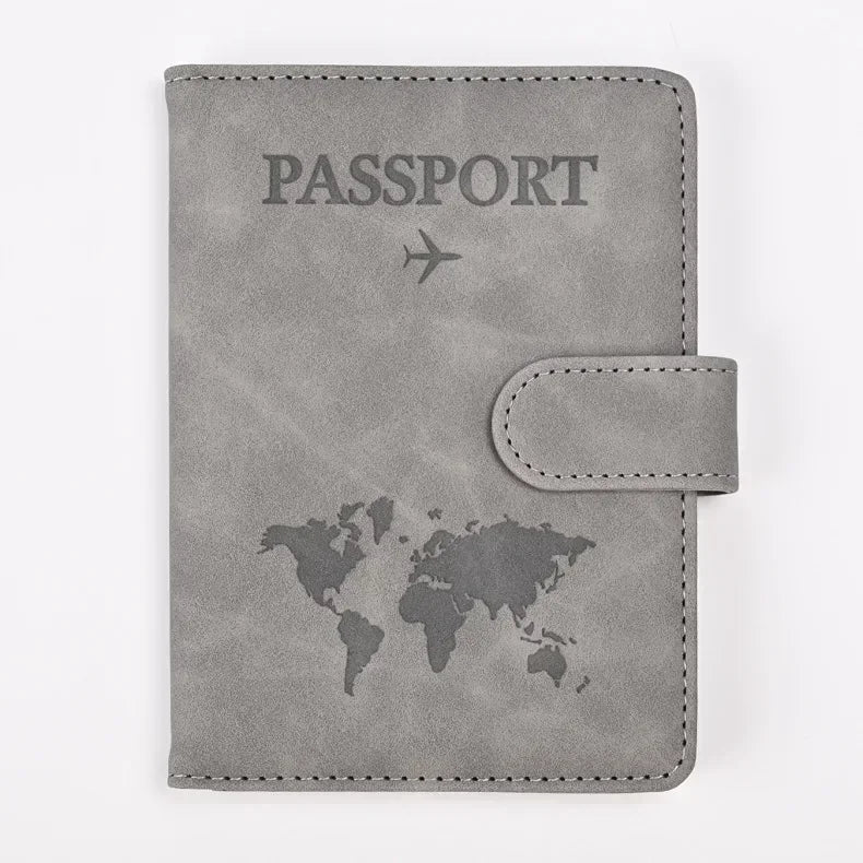 A grey genuine PU leather passport and ticket wallet cover featuring a world map silhouette.