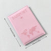 Couverture de passeport en cuir PU rose avec une silhouette de colombe représentant la carte du monde et un avion.