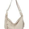 A beige soft nylon crossbody shoulder bag with an adjustable strap.