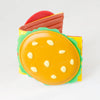 A colorful foldable 3D card holder wallet featuring a layered design with red, yellow, and green accents.