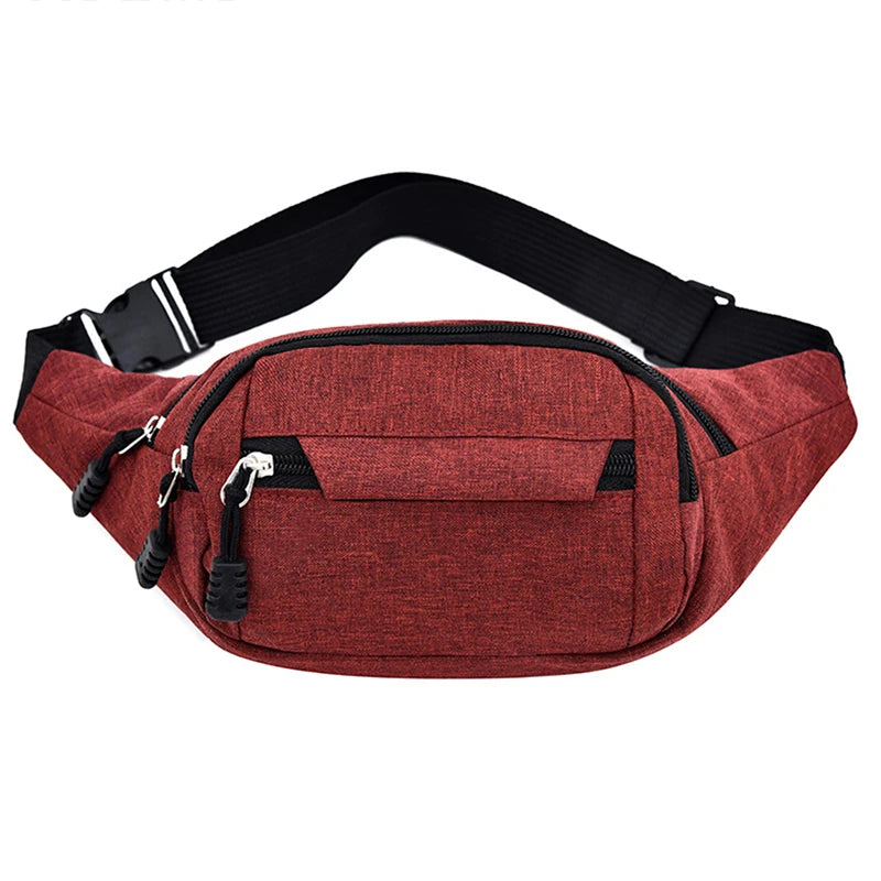 A maroon canvas waist fanny bag with black straps and zippers.