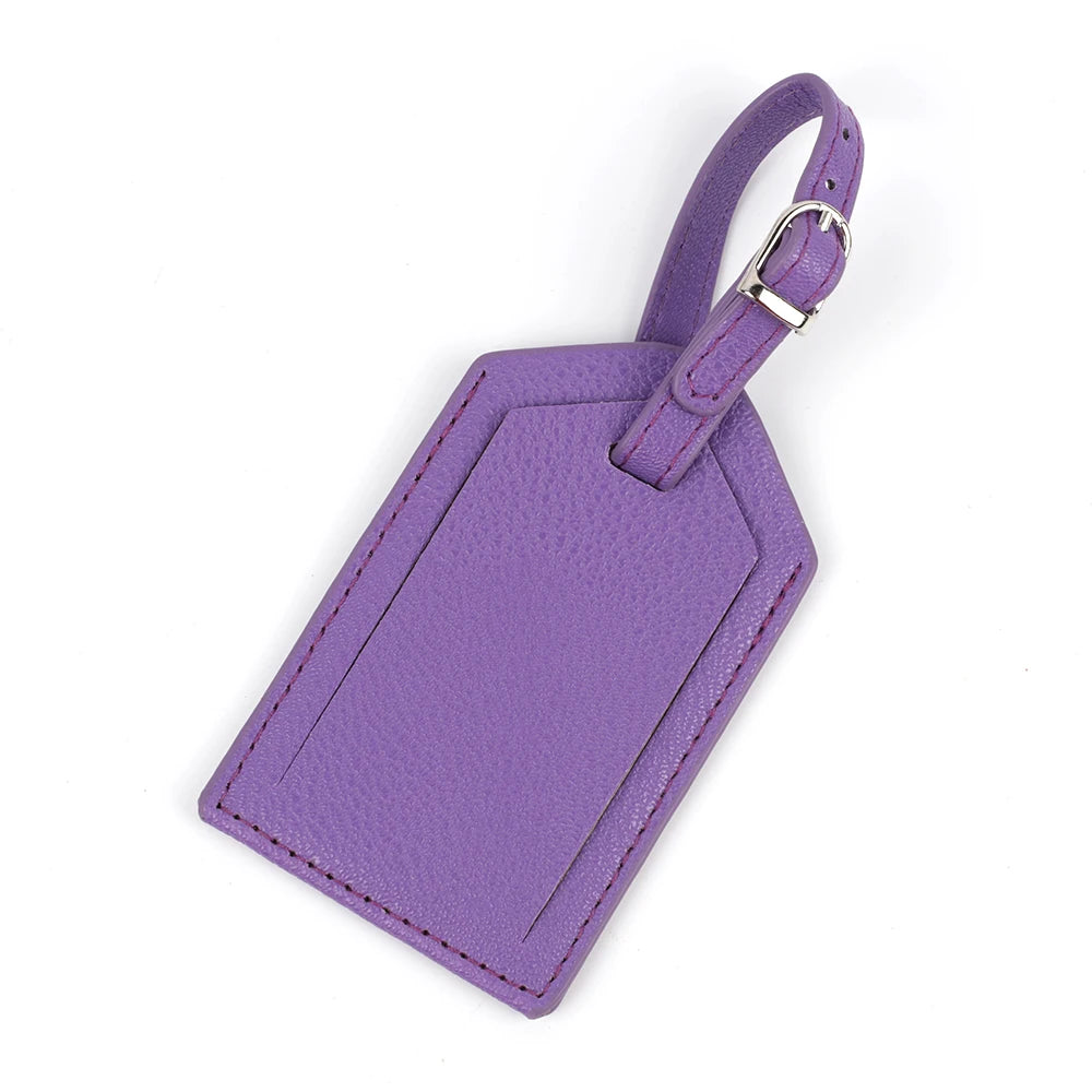 A purple PU leather luggage tag with a loop for attaching to bags or suitcases.