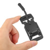 A hand is holding a black magnetic quick release buckle for belts and bags.