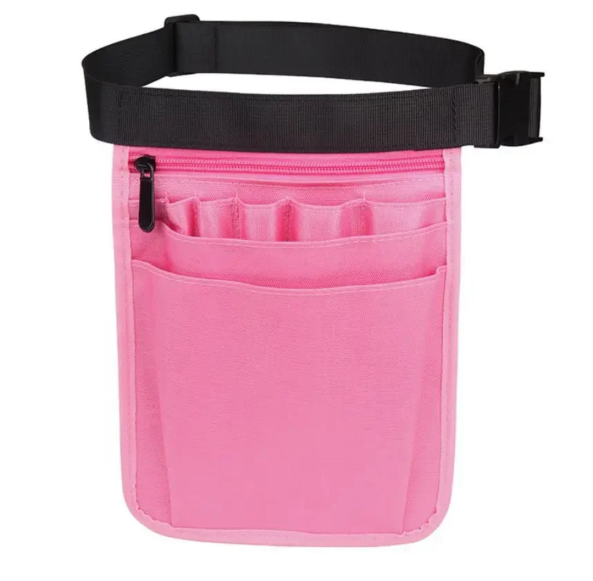 A pink nurse organizer belt waist bag with multiple pockets and a black strap.
