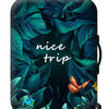 A dark teal and green leaf pattern printed on a black suitcase with wheels.