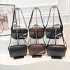 Three black leather crossbody coin purse and mobile phone bags displayed on a white surface.
