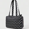Black tote bag with white polka dots featuring piano lace trim and a bow detail