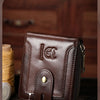 A brown genuine leather business leisure wallet is shown with a slot for inserting a bank card.
