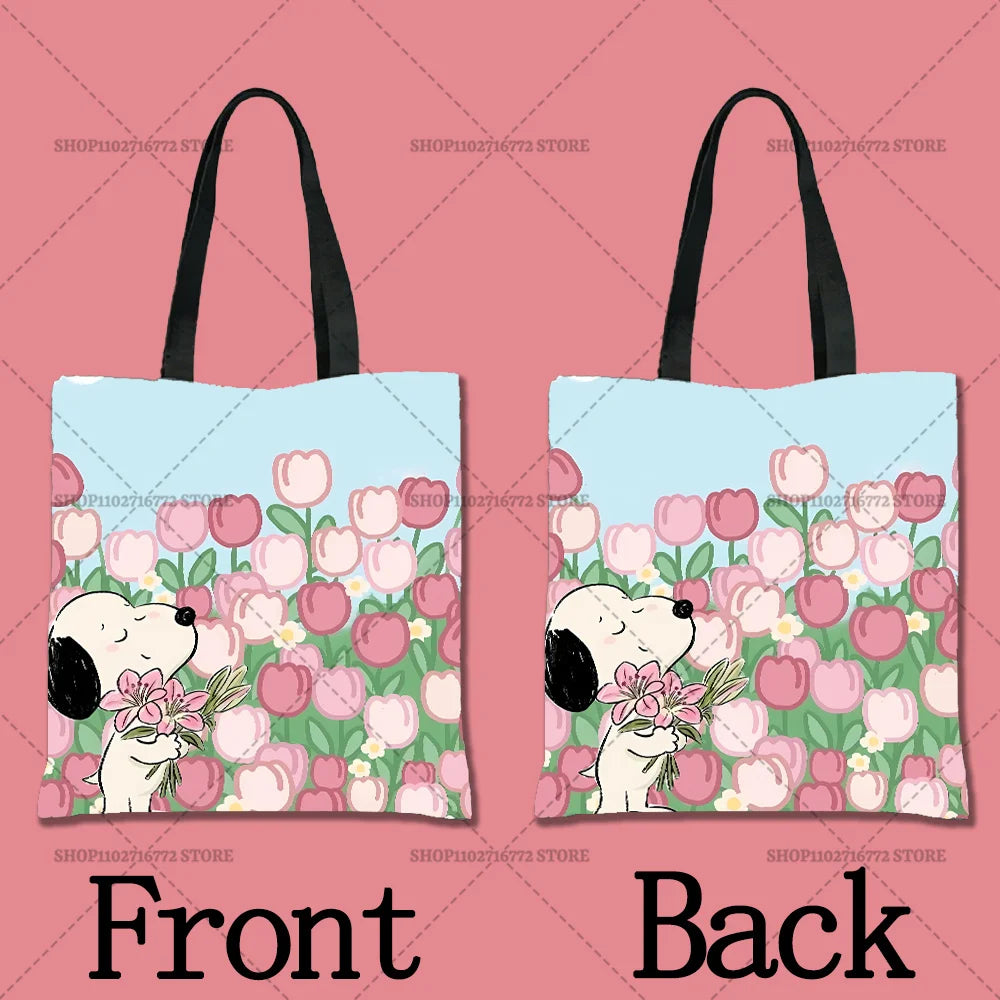 A pink background showing a tote bag design featuring a floral pattern with a cartoon dog face on the front and back.