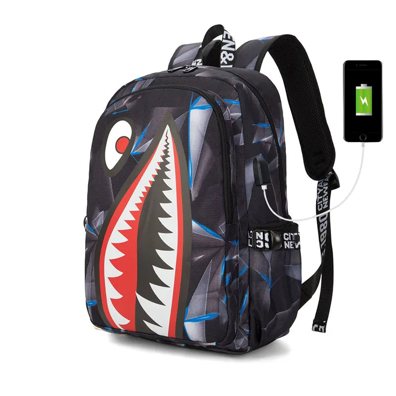 A black casual travel backpack featuring a stylized tooth design and an attached power bank.