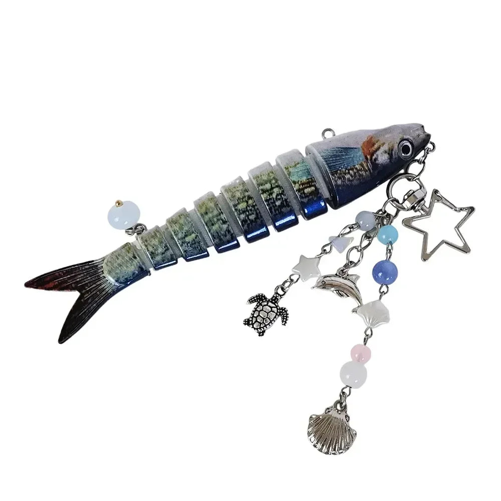 A simulation fish keychain featuring a realistic, colorful fish design with a dangling charm.