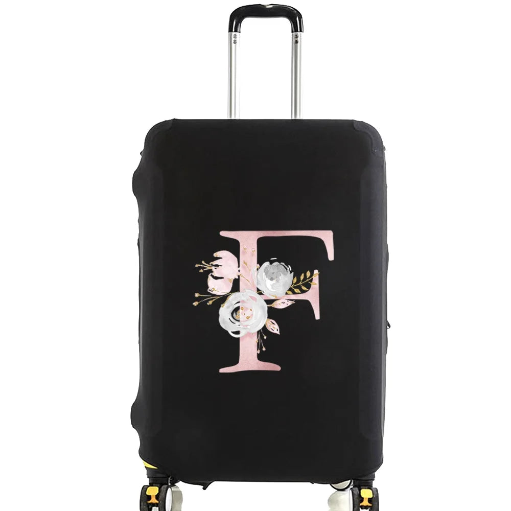 Black luggage protector cover with a large pink floral initial design