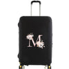Black luggage protector cover with a large pink floral monogram on the front