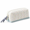 A light cream pencil case with a vertical quilted pattern and colorful dots, featuring a gray fabric tie.