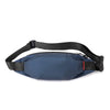 A navy blue water-resistant nylon waist bag with a black adjustable strap.
