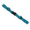 A teal adjustable tactical backpack chest strap harness with black webbing and buckles.
