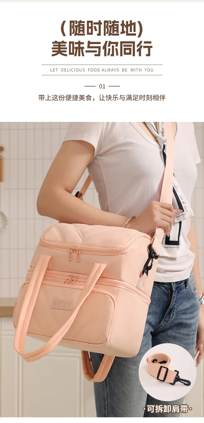 A woman is holding a light pink insulated lunch bag with a strap, demonstrating its use for carrying food.