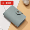 A light blue premium PU leather wallet is shown lying on a beige surface.