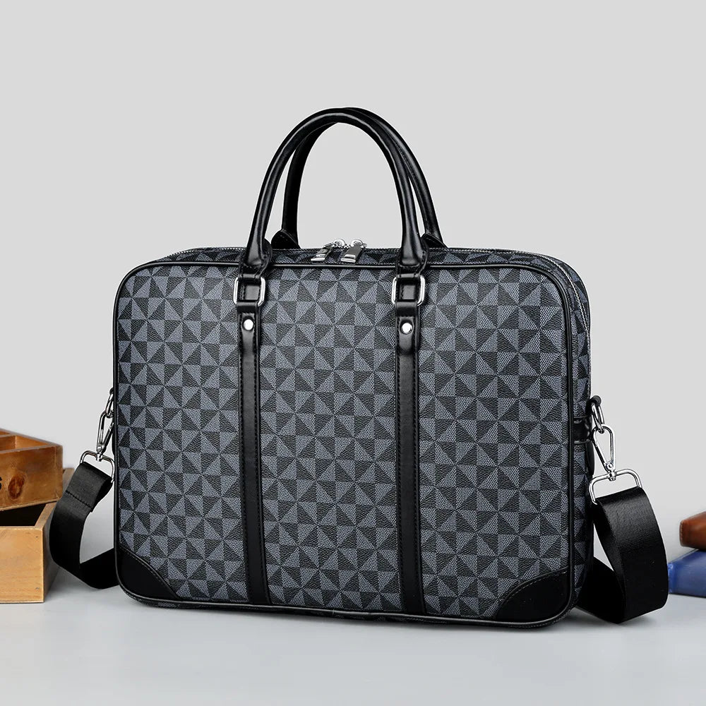 A dark gray luxury PU leather business briefcase with black trim and a handle is shown on a light surface.