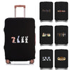 Black elastic luggage cover with a cartoon print featuring various animal characters.