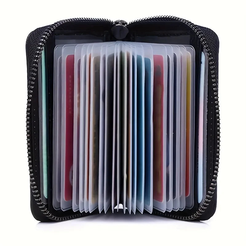A black minimalist multi-card wallet with a clear plastic sleeve showing multiple cards.