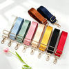 A collection of adjustable nylon shoulder straps in various colors including brown, navy blue, mint green, pink, beige, yello