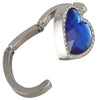 Silver heart-shaped metal foldable bag hooks featuring a large blue gemstone.