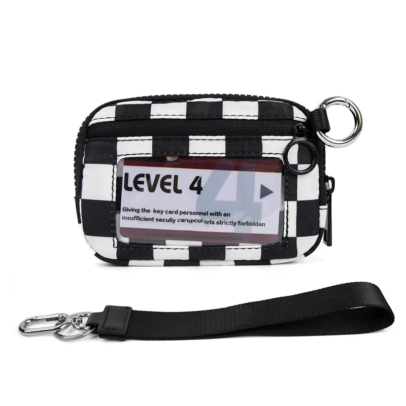 A black and white checkered wallet with a clear window displaying the text Level 4.