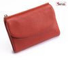 A genuine leather mini card holder wallet in a reddish-brown color shown from the side.