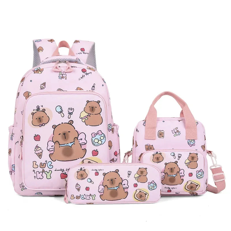 A pink cartoon animal backpack set featuring cute bear characters and various accessories.