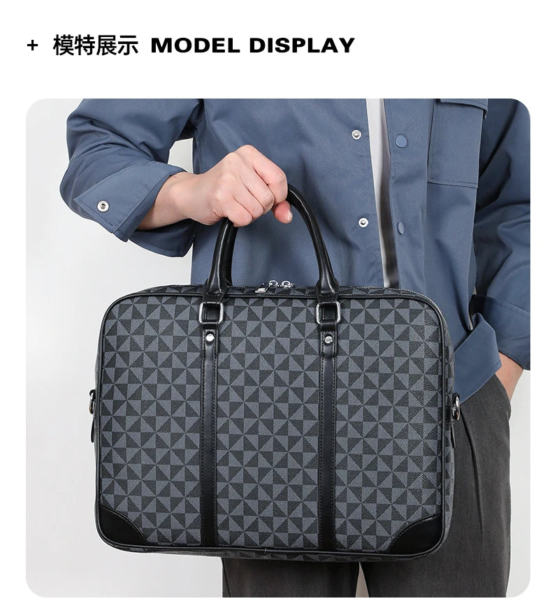A person holds a dark gray executive PU leather laptop briefcase with a shoulder strap.