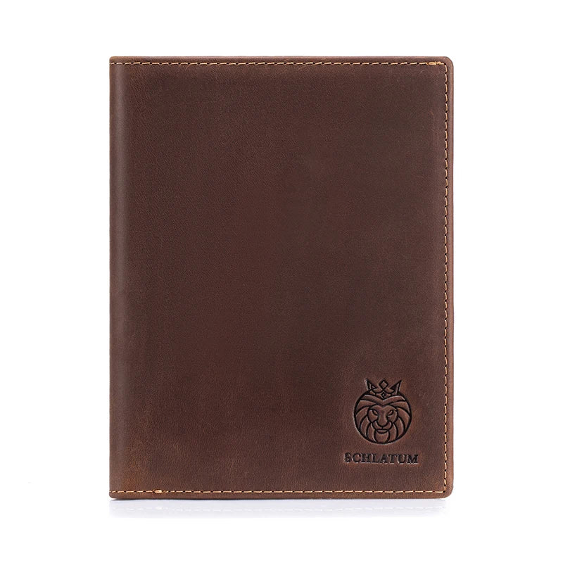 A dark brown genuine leather passport and travel wallet with a stitched edge and a lion emblem.