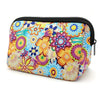 A portable neoprene cosmetic organizer bag featuring a vibrant floral pattern in blues, oranges, and purples.