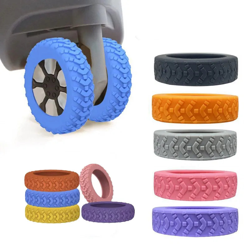 A set of silicone luggage wheel protection rings in various colors including blue, orange, gray, pink, and purple.