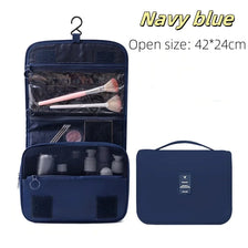 Navy blue waterproof makeup organizer and travel pouch with a clear interior and a separate zippered compartment.