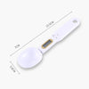 A white precision digital kitchen scale with a handle, showing its dimensions.