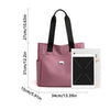 A pink nylon shoulder tote bag with black straps shown next to a white tablet.