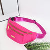 A bright pink multi-layer sports waist bag with a gold zipper is displayed on a white surface.
