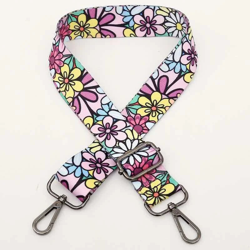 A colorful floral patterned adjustable crossbody strap for handbags