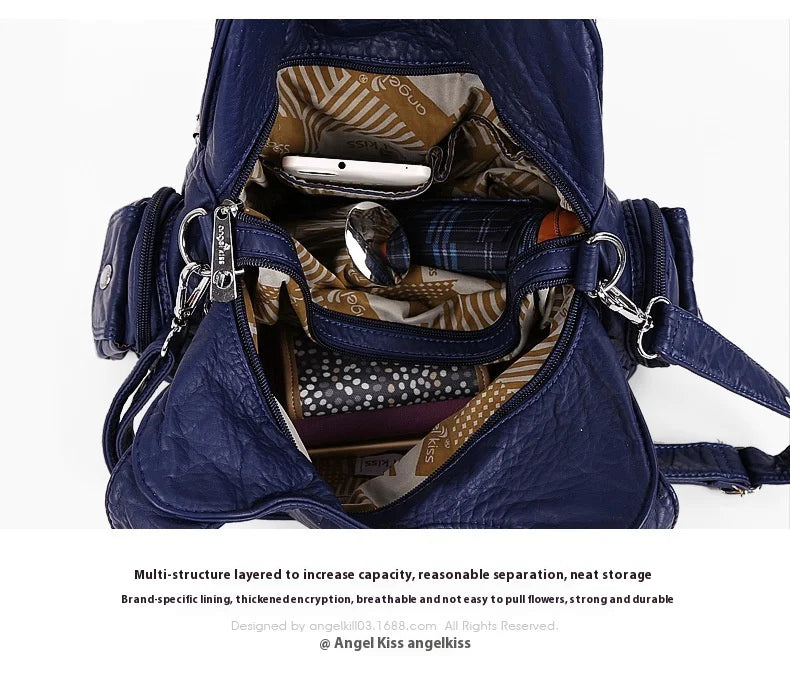 A dark blue PU leather hobo shoulder bag is shown open, displaying interior organization and lining.