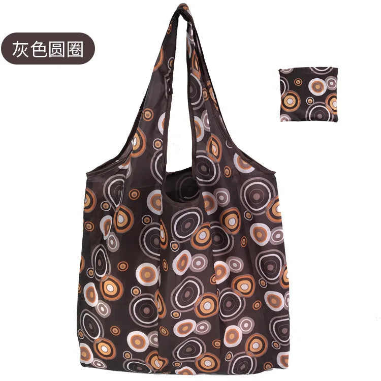 A reusable eco tote shopping bag with a brown and white patterned fabric.