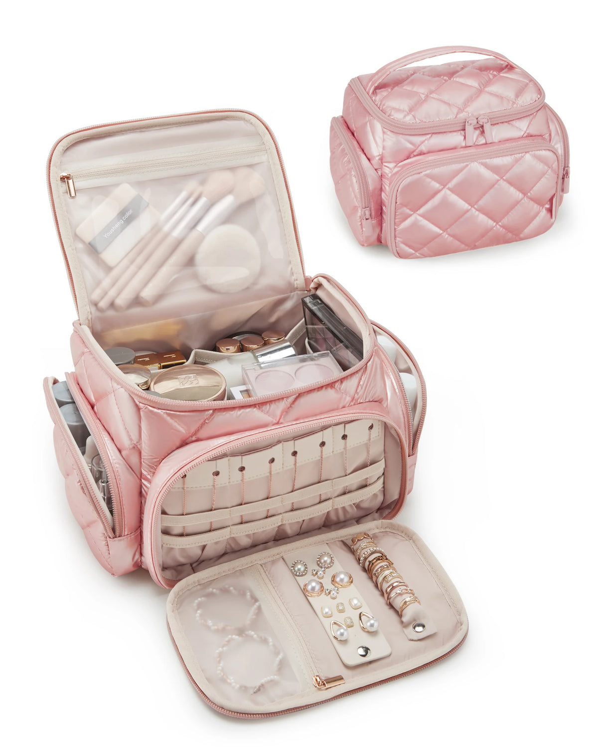 A pink quilted multi-compartment travel organizer bag with a hinged lid and an open front section.
