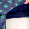 A dark blue reusable shopping bag with green stars, showing the interior fold.