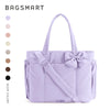 A lavender large capacity tote bag with a bow detail shown against a white background.