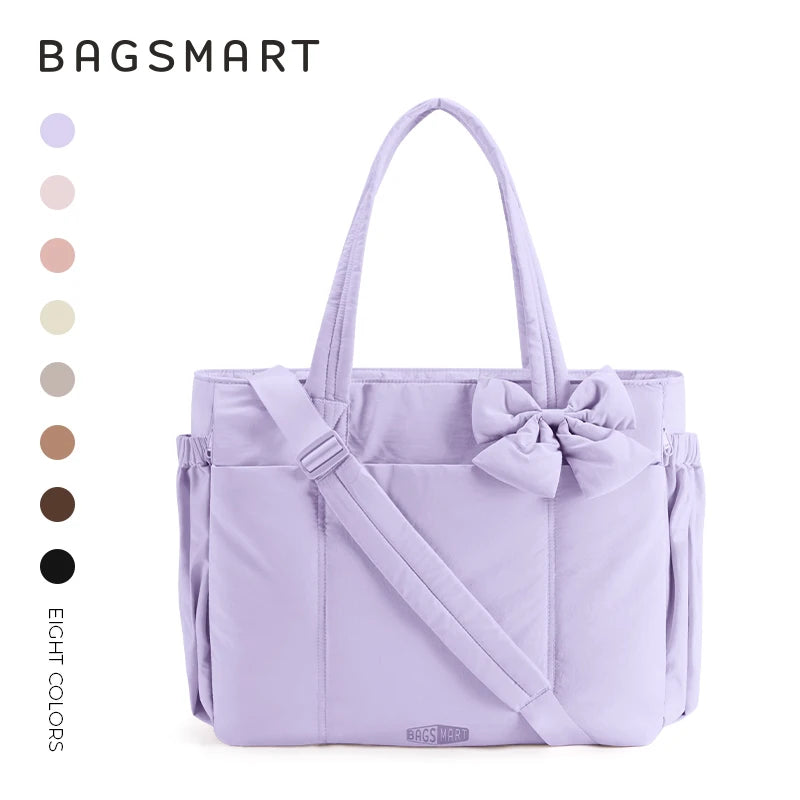 A lavender large capacity tote bag with a bow detail shown against a white background.