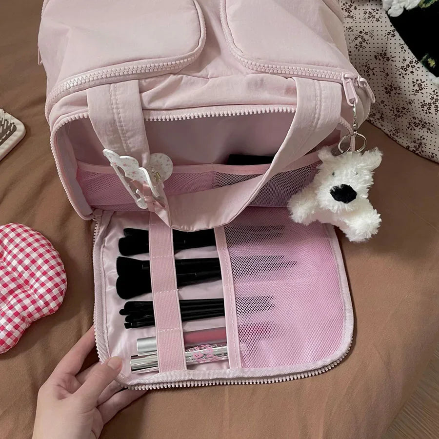 Pinkes Luxus-Makeup-Organizer-Beutel mit Reißverschluss und klarem Netzfach für Pinsel und Werkzeuge.