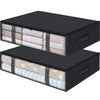 A set of three black under bed storage organizer bins filled with various fabric items.