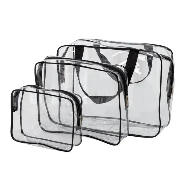 A set of three clear PVC travel toiletry bags with black straps.