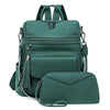 A dark teal retro PU leather travel backpack with a tassel detail shown in a studio shot.
