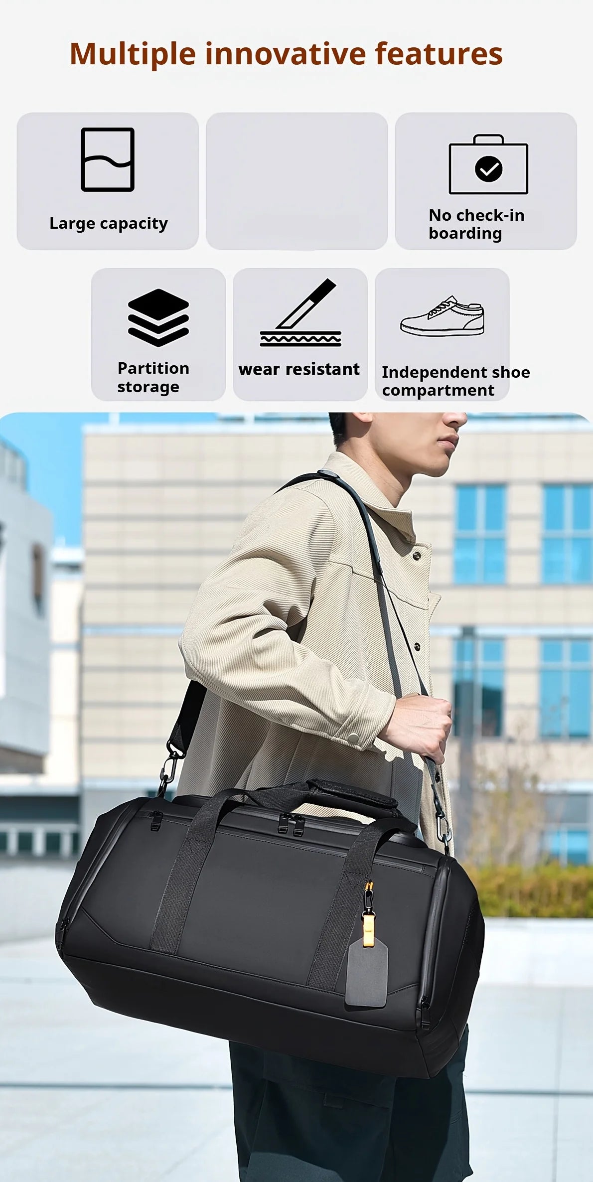 A person is carrying a large black travel duffel bag with multiple innovative features.
